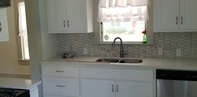 client photo kitchen sink with white custom cabinet